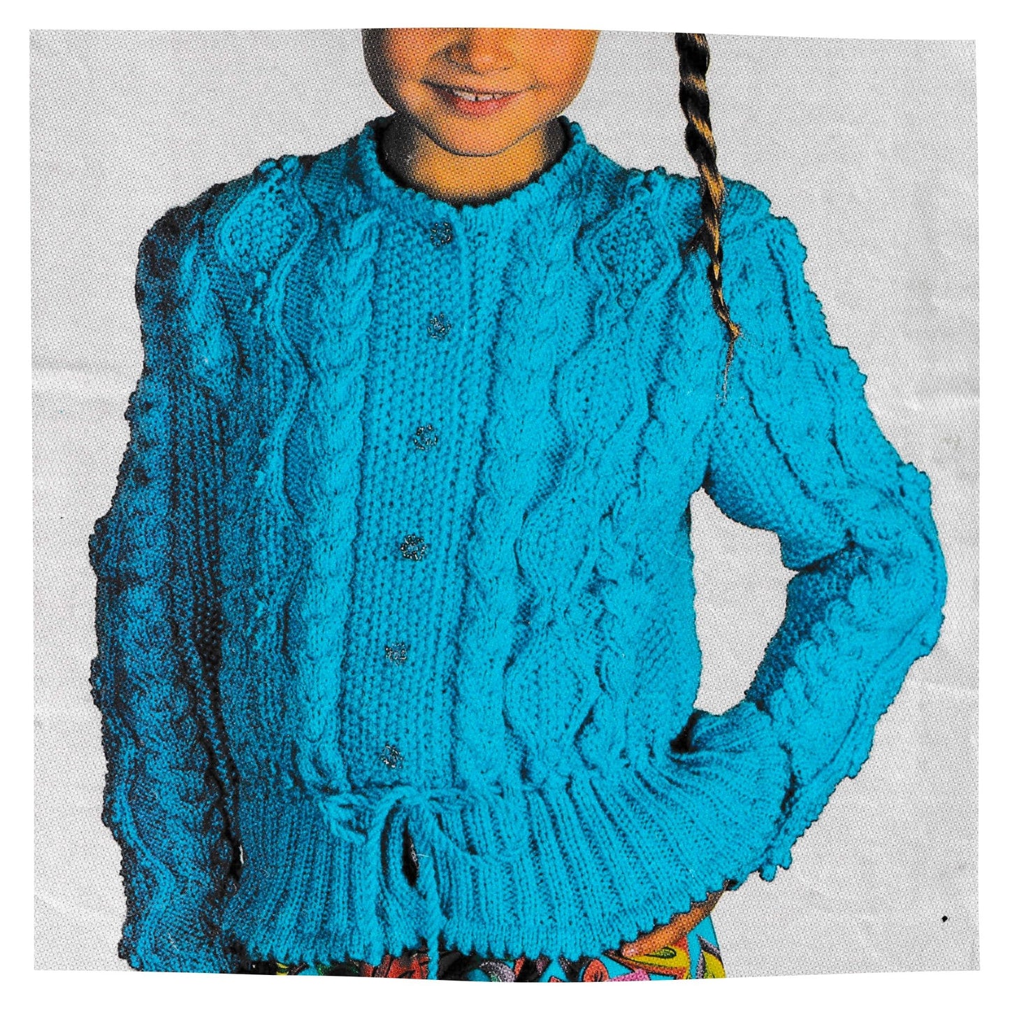 Girls Peplum Style Cardigan Knitting Pattern